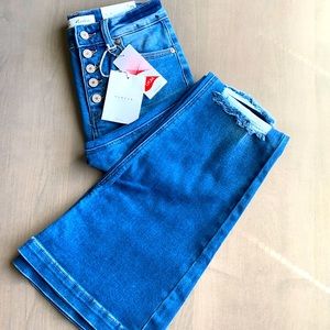 Kancan petite flares with knee distressing